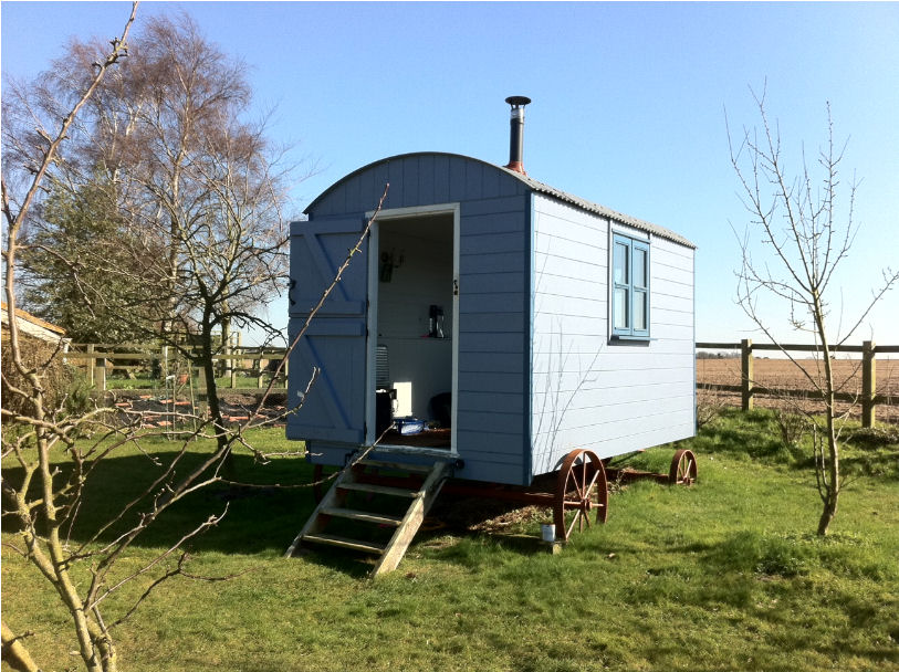 Blue Shepherds Hut in Field