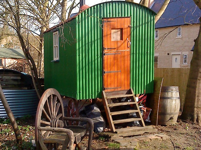 Green Shepherds Hut in Yard